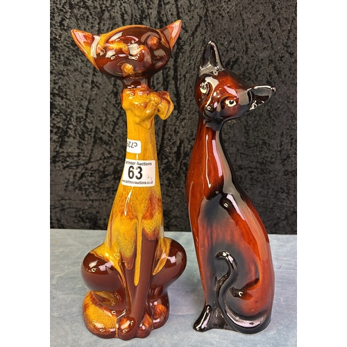 63 - Blue Mountain Pottery Harvest Gold cat, approx 32cm tall, with a similar friend