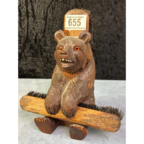 655 - Handsome vintage Black Forest bear with ‘his and hers’ clothes brushes. 20cms total height. Paws int... 