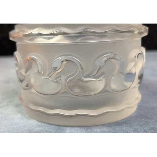 658 - Lalique Crystal swan / duck design circular lidded jar with frosted lid, approx 6.5cm tall and 10cm ... 