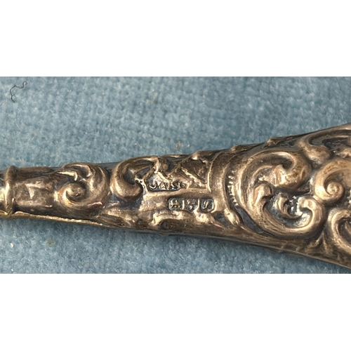 668 - Decorative silver handled button hook.