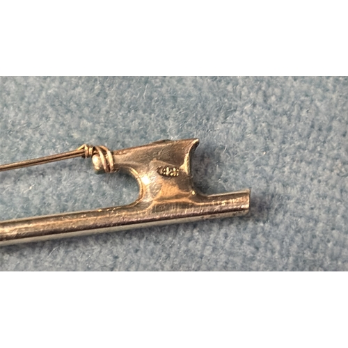 677 - Miniature wooden violin with silver bow and clasp.