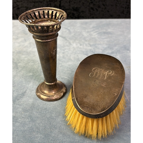 681 - Silver backed hairbrush Birmingham 1923 and silver spill vase. Birmingham 1908 60 gms. Both in a lid... 