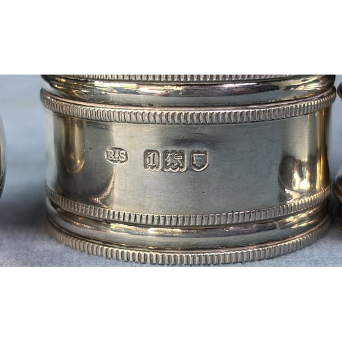 687 - 4 similar silver napkin rings. Various dates. 68 gms.