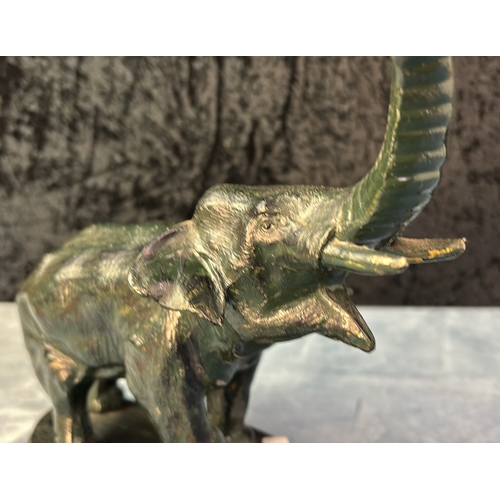 7 - Heavy metal painted elephant figurine with screw fitting in trunk (possibly for fitting of a lamp?),... 