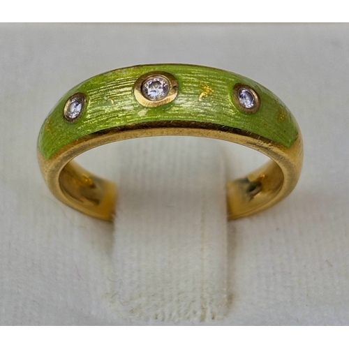 707 - Stunning 18ct gold Faberge ring with green brushed enamel decoration and set with 3 diamonds. Approx... 