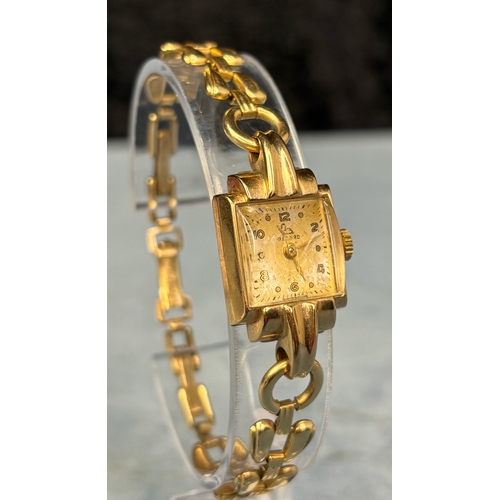 716 - Pretty vintage ladies 9ct gold cased watch on a 12ct  rolled gold bracelet.