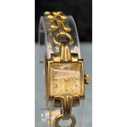 716 - Pretty vintage ladies 9ct gold cased watch on a 12ct  rolled gold bracelet.