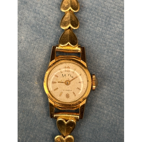 717 - Lovely 18ct gold ladies watch and 9ct gold bracelet with hearts. 13.9 gms total weight.