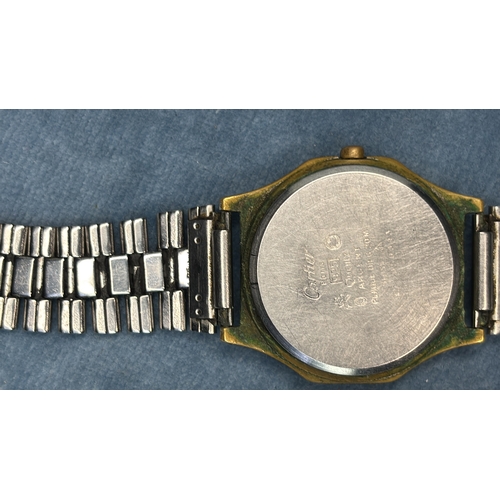 722 - Gents silver Cartier quartz watch with stainless steel bracelet strap.