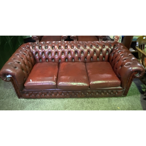 752 - Fine example of a 3 seater leather Chesterfield sofa on casters in the most desirable colour of red ... 