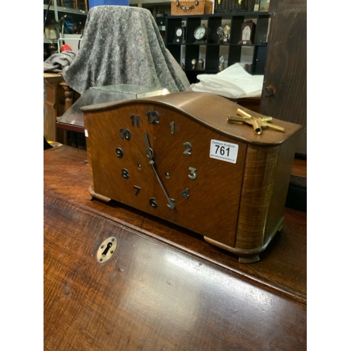 761 - Handsome 1940's/50's oak veneer cased mantle clock with key.