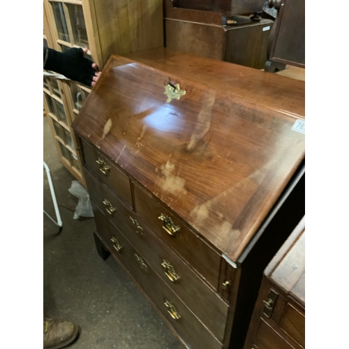 763 - Superb Georgian mahogany bureau with fitted interior and highly polished brass handles.  Original ke... 