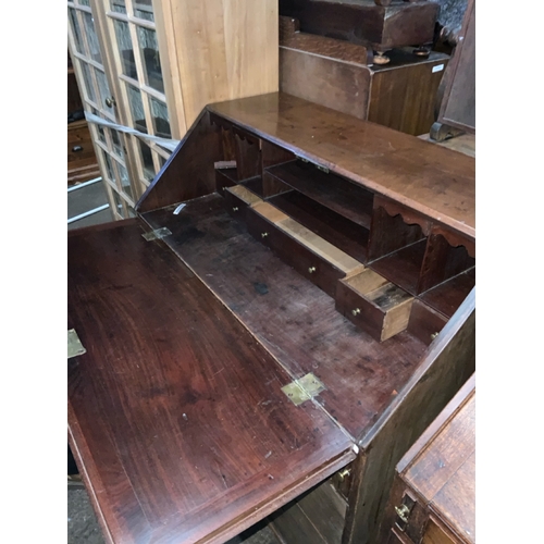 763 - Superb Georgian mahogany bureau with fitted interior and highly polished brass handles.  Original ke... 