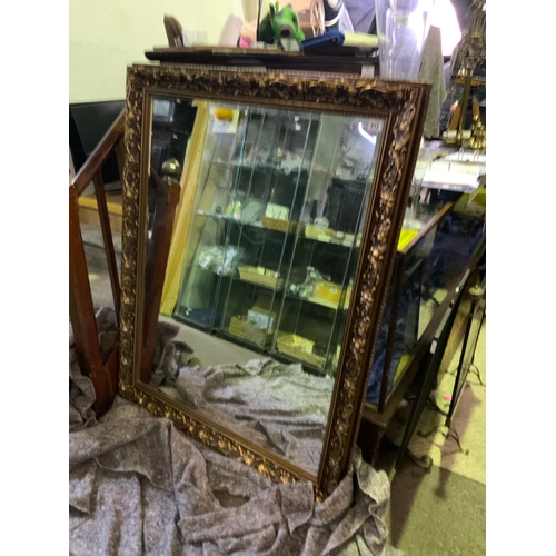 812 - A magnificent gilt framed wall mirror with bevelled glass H125cm x 127cm