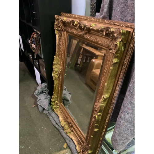 813 - Superb large Rococo style, gilt framed wall mirror with bevelled glass and elaborate gilt decoration... 