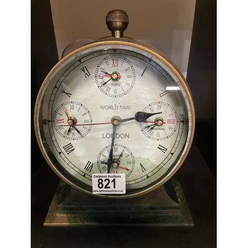 821 - Large brass World Time circular desktop / mantel quartz clock with bevelled glass, approx 26cm tall