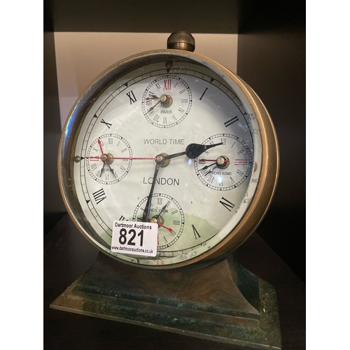 821 - Large brass World Time circular desktop / mantel quartz clock with bevelled glass, approx 26cm tall