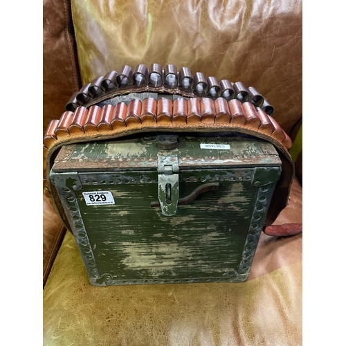 829 - Wooden sectioned ammunition crate with two leather cartridge belts and a gun dog ground tether