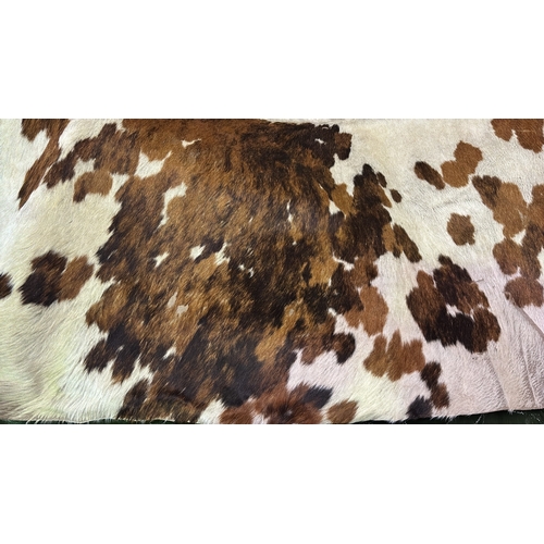 890 - A superb full hair on cowhide, in original packing. Perfect for leather workers etc Really beautiful