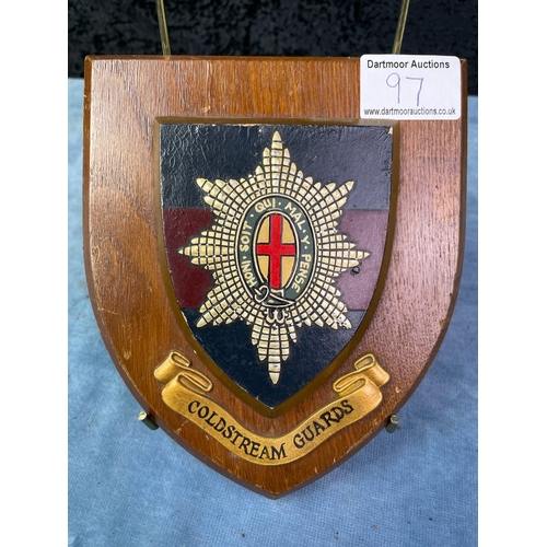 97 - Armorial wooden shield with a hand painted plaque depicted the crest of the ColdStream Guards