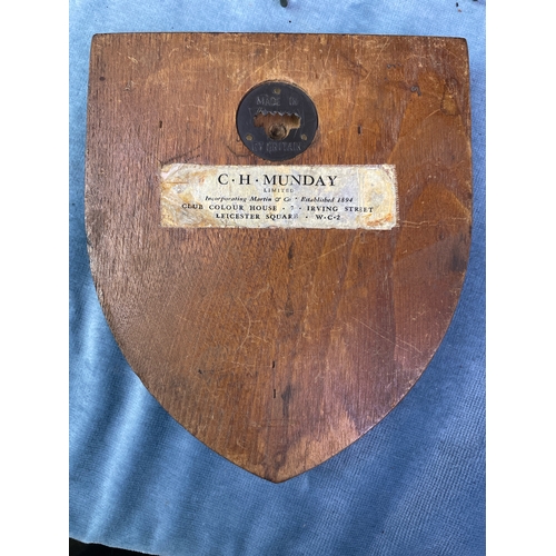 97 - Armorial wooden shield with a hand painted plaque depicted the crest of the ColdStream Guards