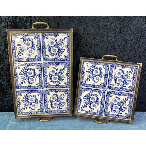 10 - Two wooden trays with brass handles and blue and white porcelain tiles with floral design