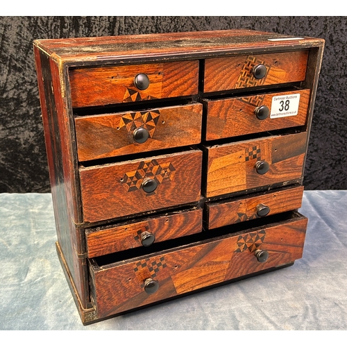 38 - Desktop chest of drawers with marquetry detailed drawers, lacquered inside. Measures approx 30cm x 2... 