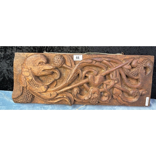 44 - Heavy wooden carved bas relief plaque / panel depicting a serpent with arrow, measures approx 22cm x... 