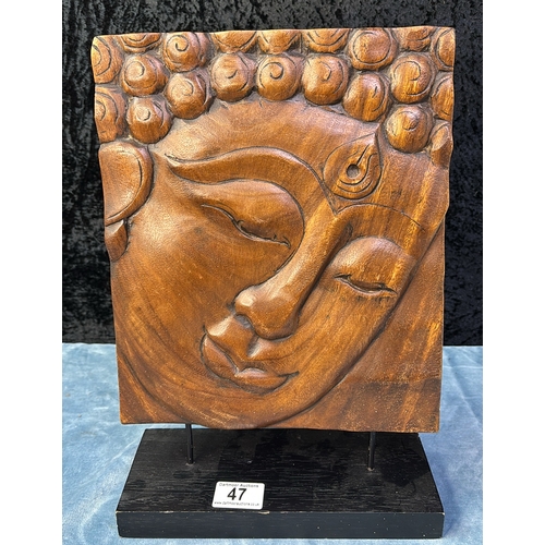 47 - Modern wooden carved plaque depicting a Buddha, approx 38cm tall