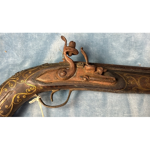 48 - Decorative Eastern flintlock pistol for with wire detail in relief, a/f