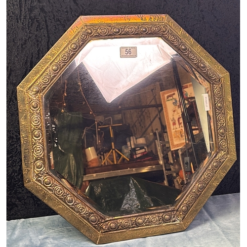 56 - Brass framed octagonal bevel edged mirror, approx 50cm diameter