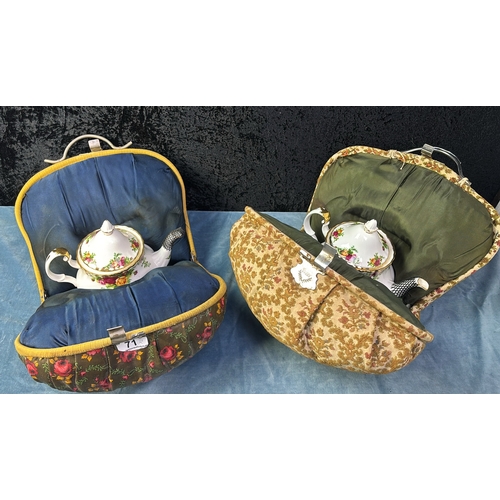 71 - Two padded fabric teapot warmers with handles, c1950s, each containing a Royal Albert Old Country Ro... 