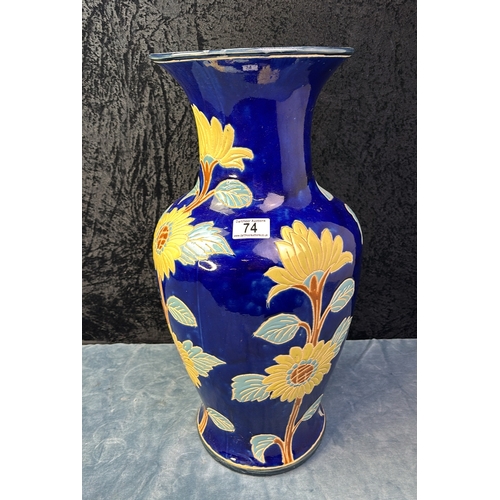 74 - Large floor standing vase depicting sunflowers, approx 52cm tall