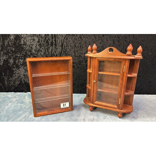 81 - Two small wall mounted wooden display cabinets, approx 30cm and 25cm tall