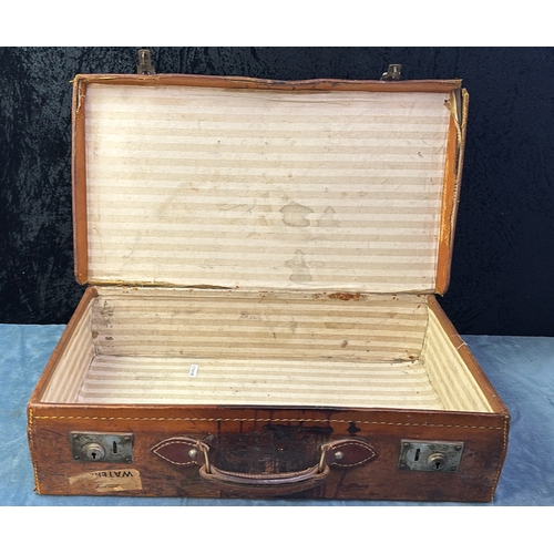 91 - Vintage Legge’s leather suitcase