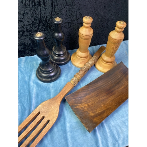 190 - Large box of collectible decorative items Inc large carved ethnic fork, turned wood lamp bases, and ... 