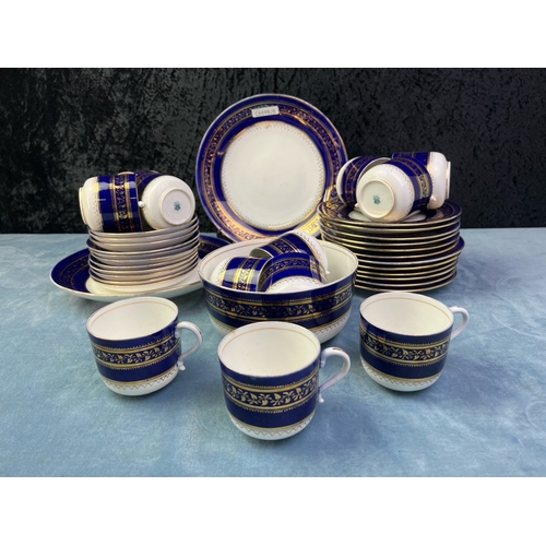 225 - Beautiful cobalt blue Coalport teacups, saucers, plates and bowls