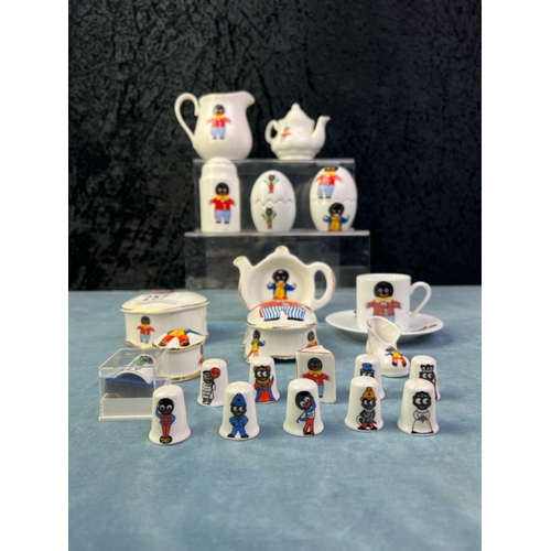 257 - Golly collectibles inc thimbles, MacDonald salt and pepper pots, trinket pots, jug and mini teapot