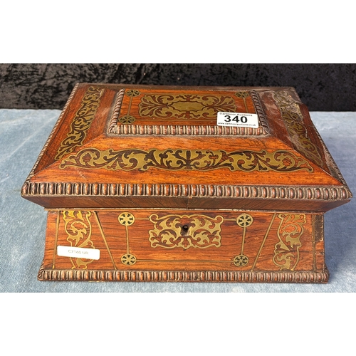 340 - A classic rosewood veneer gold inlaid sarcophagus style box, with key, ruched and felt  internal lin... 