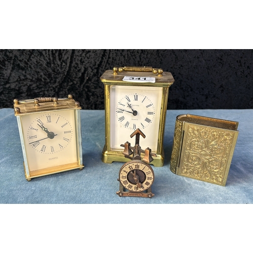 341 - 4 fabulous antique and vintage travel and desk clocks. Funkiest is the teeny antique desk clock that... 