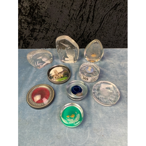 369 - 9 glass paperweights inc art glass Wedgwood crystal Kingfisher Heron and Christmas pieces etc