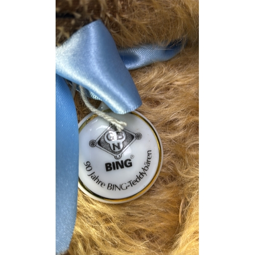 392 - German made Bing 90 year anniversary teddy bear with porcelain tag. Mohair fur with felt pads, growl... 