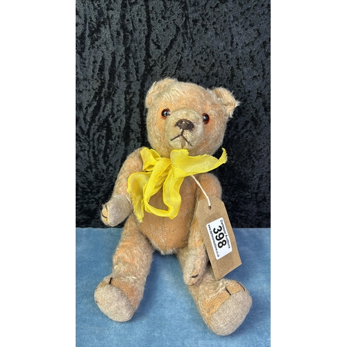 398 - Vintage / antique teddy bear with (patchy) mohair fur, original pads, shaved muzzle and stitched nos... 