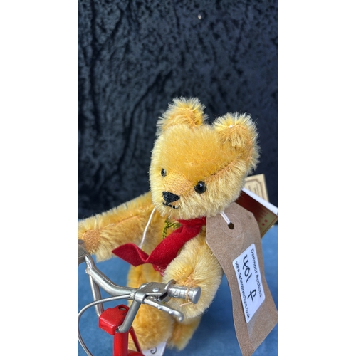 401f - Hermann limited edition no 665/1000 miniature teddy bear on a red metal scooter. Bear approx 17cm ea... 