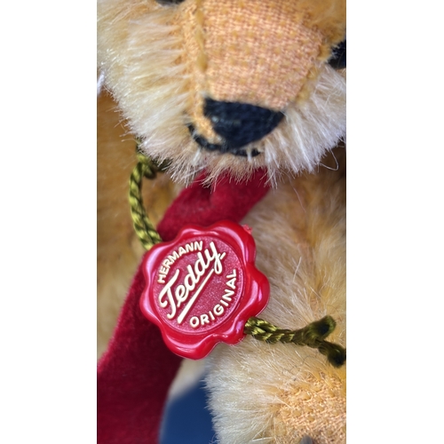 401f - Hermann limited edition no 665/1000 miniature teddy bear on a red metal scooter. Bear approx 17cm ea... 