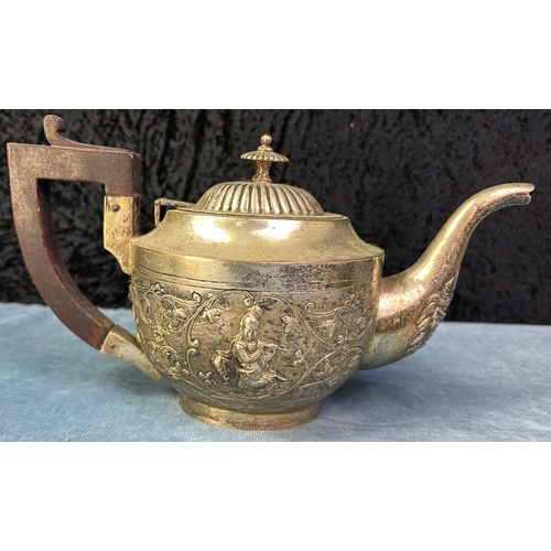 407 - Siamese influence repoussé style white metal tea set comprising teapot, sugar bowl and milk jug