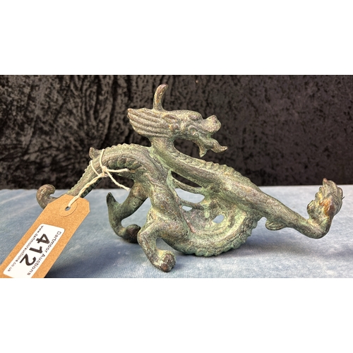 412 - Fabulous, heavily patinated cast bronze Chinese dragon, of some age. Well detailed, unusual pose