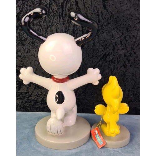 437 - Westland Peanuts large Snoopy and Woodstock figurines, approx 33cm and 17cm tall