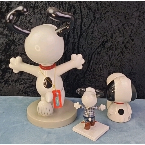 438 - Westland Peanuts large Snoopy figurine, approx 233cm tall with tag, a Westland ‘Back to School’ snoo... 