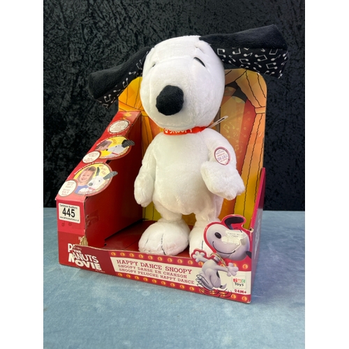 445 - A boxed Peanuts The Movie Happy Dance cuddly soft toy Snoopy in original box (needs new batteries), ... 